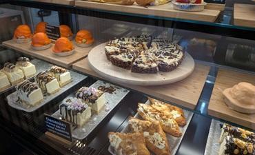 Cakes in a display cabinet